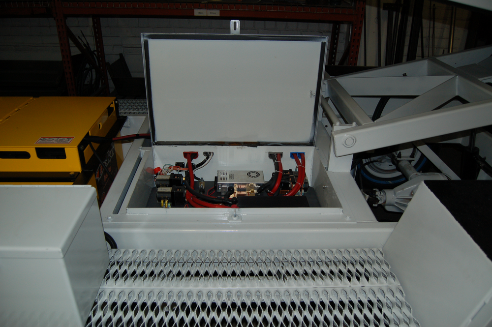 A view of the electric component box assembly on a converted belt loader.