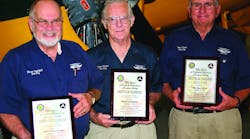 Dave Becker , of Fayetteville, GA, and Elmer Koldoff, of Peachtree City, GA, receive Charles E. Taylor Master Mechanic Awards. Also shown is Ray &apos;Pop&apos; Wilson who received the Master Pilot Award.