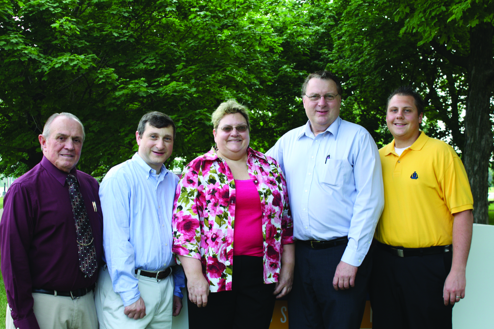 Charles Taylor II visited AMT recently. He is the great grandson of Charles E. Tayor. Show with Tom Hendershot, Barb Zuehlke, Ronald Donner, and Jon Jezo.