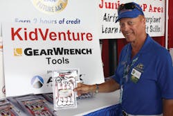 Dan Majka, Chairman of EAA KidVenture, shows some of the tools given to youngsters for task series completion.