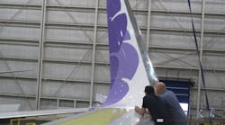 ATS technicians admiring the completion of an APB blended winglet installation on a Hawaiian Airlines aircraft. ATS technicians admiring the completion of an APB blended winglet installation on a Hawaiian Airlines aircraft.