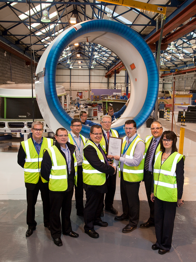 Pictured receiving the AS9110 Rev A certificate from LRQA UK Business Centre Manager, David Derrick, is Roy Campbell, Bombardier Customer Services MRO Manager &ndash; Europe and Asia Pacific. Also pictured, from left to right, are Paul McKane, Senior Product Support Engineer, Bob Markham, Senior Repairs Assessor, Gary McKeown, Principal Quality Engineer, Robert Watson, Quality Manager (all Bombardier Aerospace, Belfast), David Kneller, Project Manager, LRQA, and Catherine McKeever, Director, Quality, Bombardier Aerospace, Belfast.