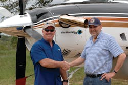 From left: Jim Allmon, president of Blackhawk, and Dr. Eugene Meyer celebrate delivery of Meyer&apos;s newly upgraded XP42A Cessna 208B Caravan. It is first delivery of a Blackhawk-upgraded Caravan in Africa.