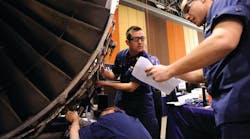 Petty Officer 2nd Class Josh Barrio (right) gives maintenance instructions to Petty Officer 1st Class Jacob Linder (top left) and Petty Officer 2nd Class Christopher Novak (bottom left) while the took part in an event during the AMT Society’s Maintenance Skills Competition. U.S. Coast Guard photo by Petty Officer 3rd Class Seth Johnson. Petty Officer 2nd Class Josh Barrio (right) gives maintenance instructions to Petty Officer 1st Class Jacob Linder (top left) and Petty Officer 2nd Class Christopher Novak (bottom left) while the took part in an event during the AMT Society’s Maintenance Skills Competition. U.S. Coast Guard photo by Petty Officer 3rd Class Seth Johnson.