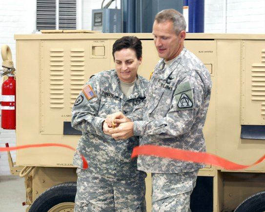 Col. Cheri A. Provancha, Letterkenny Army Depot Commander and Col. Anthony Potts, Program Manager, Aviation Systems cut the ribbon recognizing the successful completion of the First Article Testing for the Aviation Ground Power Units.