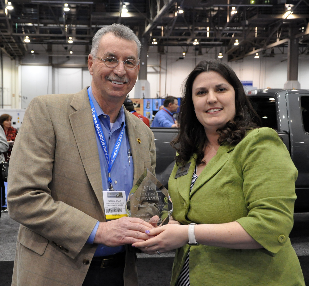 Lifetime Achievement: Bill Jacob, vice president of the UPS ground support division, accepts his award from GSW Publisher Missy Zingsheim.