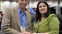 Lifetime Achievement: Bill Jacob, vice president of the UPS ground support division, accepts his award from GSW Publisher Missy Zingsheim.