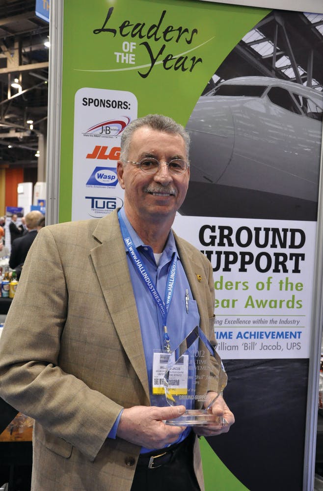 Bill Jacob, vice president of the UPS ground support division, with his Lifetime Achievement Award.