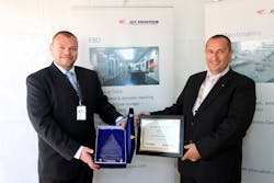 Wynand Meyer, Vendor Relations Manager, Africa, Middle East &amp; India, Jeppesen Trip Planning Services, presenting the award to Philippe Gerard, Director FBO, Jet Aviation Dubai.