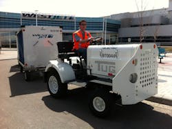 WestJetter Leigh Hoey sits atop a lithium polymer-powered baggage tug, developed in partnership with Corvus Energy of Richmond, BC. (CNW Group/WestJet) WestJetter Leigh Hoey sits atop a lithium polymer-powered baggage tug, developed in partnership with Corvus Energy of Richmond, BC. (CNW Group/WestJet)