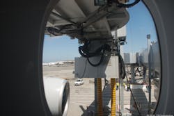 Passengers in the coach section of an A380 can see the the underside of the jet bridge connecting the gate to the upper deck. Would this be a good place for a camera on the typical jet bridge? Passengers in the coach section of an A380 can see the the underside of the jet bridge connecting the gate to the upper deck. Would this be a good place for a camera on the typical jet bridge?