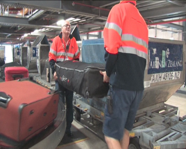 Extra heavy checked bags often need an extra set of hands to effectively handle the load.