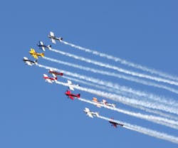 Team RV flies a 12-ship aircraft formation as part of its high-energy performance. Photo courtesy of EAA. Team RV flies a 12-ship aircraft formation as part of its high-energy performance. Photo courtesy of EAA.