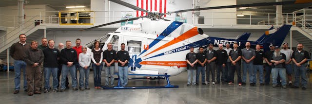 Pictured in the photo Mercy Flight BK117 Helicopter and the HSI team.