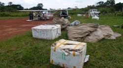 MAF personnel load medicine and supplies aboard the small MAF plane bound for Zobia. The remaining supplies were delivered on later flights. A new airstrip in this DRC village is enabling the delivery of staff and medicine to combat malaria.