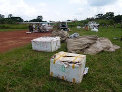 MAF personnel load medicine and supplies aboard the small MAF plane bound for Zobia. The remaining supplies were delivered on later flights. A new airstrip in this DRC village is enabling the delivery of staff and medicine to combat malaria.