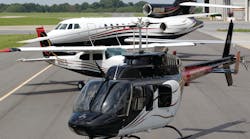 Many aircraft owners use the same basic design for all their aircraft, as is the case with this Bell 206, Cessna 210, and Falcon 50.