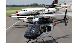 Many aircraft owners use the same basic design for all their aircraft, as is the case with this Bell 206, Cessna 210, and Falcon 50.