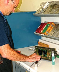 If you are rusty on how things work ask for a demonstration. In this picture Dave Paine demonstrates setting. up an ultrasonic test If you are rusty on how things work ask for a demonstration. In this picture Dave Paine demonstrates setting. up an ultrasonic test