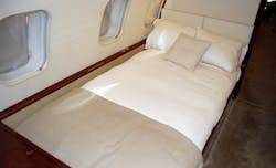 The modification of the aft cabin enabled the installation of a permanent custom-made bed in the aft cabin which is located opposite two new single seats and next to a customized side-ledge. The modification of the aft cabin enabled the installation of a permanent custom-made bed in the aft cabin which is located opposite two new single seats and next to a customized side-ledge.