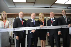 Universal Weather and Aviation, Inc. Chairman of the Board Greg Evans officially cuts the ribbon at the inauguration celebration of the completely refurbished FBO at Universal Aviation Stansted. Evans said the renovation of Universal Aviation Stansted is just the latest in the company's ongoing commitment to Europe and ultimately improving client experiences. Universal Weather and Aviation, Inc. Chairman of the Board Greg Evans officially cuts the ribbon at the inauguration celebration of the completely refurbished FBO at Universal Aviation Stansted. Evans said the renovation of Universal Aviation Stansted is just the latest in the company's ongoing commitment to Europe and ultimately improving client experiences.