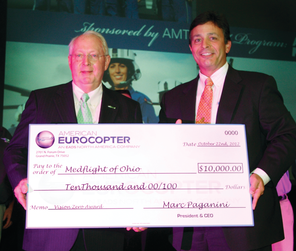 MedFlight representatives were presented with the award and a $10,000 check by Anthony DiNota, American Eurocopter Vice President of Sales, Marketing and Customer Support, during the AMTC Community Awards Banquet.