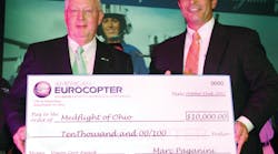 MedFlight representatives were presented with the award and a $10,000 check by Anthony DiNota, American Eurocopter Vice President of Sales, Marketing and Customer Support, during the AMTC Community Awards Banquet.