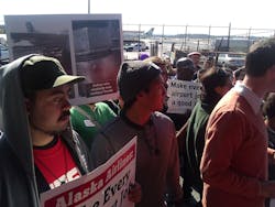 Fuelers threatened to strike in support of Alex Popescu, an ASIG fueler who workers say was suspended because he advocated for safety improvements. ASIG claims he was fired after screaming obscenities at supervisors.