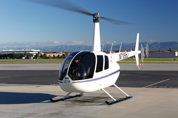 Robinson R44 ready for takeoff.