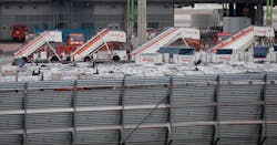 Air stairs stand empty yesterday as ground workers and flight attendants began strikes against Iberia.