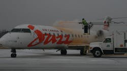 ATS crews deices Air Canada Jazz jet with new Kilfrost DFSustain at Lambert-St. Louis International Airport.