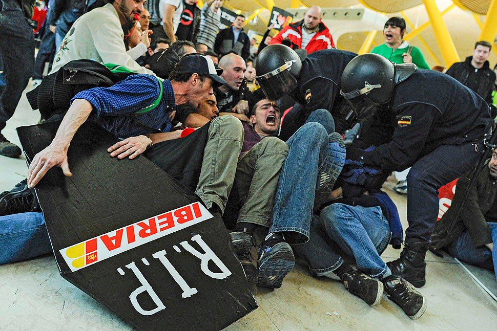 Workers at Iberia airlines begin the first of 15 days of strikes to protest the company's plan to cut almost a fifth of its workforce.