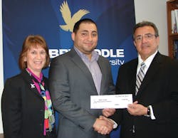 Marj Rose, President of NTBAA, and Ray Santa, Steering Committee Director and Scholarship Program Leader for NTBAA, and Director of Business Development for Jet Support Services, Inc. (JSSI), present @.500 scholarship to Dago D. Toruga
