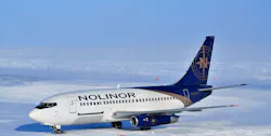 A Nolinor Aviation Boeing 737 prepares to offload it's cargo at a remote mineral exploration site after landing on an ice runway in Nunavut, Canada. (CNW Group/Uppik Aviation). A Nolinor Aviation Boeing 737 prepares to offload it's cargo at a remote mineral exploration site after landing on an ice runway in Nunavut, Canada. (CNW Group/Uppik Aviation).