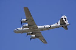 The Commemorative Air Force B-29 FIFI flies over Oshkosh in 2011 (EAA photo by P. Burmeister).