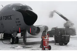 Members from the 92nd and 141st Aircraft Maintenance Squadrons apply deicer and anti-ice chemicals to a KC-135 Stratontanker on the flightline at Fairchild Air Force Base, WA. Photo courtesy of U.S. Air Force/Airman 1st Class Ryan Zeski. Members from the 92nd and 141st Aircraft Maintenance Squadrons apply deicer and anti-ice chemicals to a KC-135 Stratontanker on the flightline at Fairchild Air Force Base, WA. Photo courtesy of U.S. Air Force/Airman 1st Class Ryan Zeski.