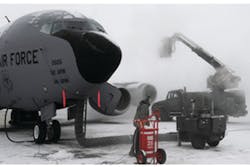 Members from the 92nd and 141st Aircraft Maintenance Squadrons apply deicer and anti-ice chemicals to a KC-135 Stratontanker on the flightline at Fairchild Air Force Base, WA. Photo courtesy of U.S. Air Force/Airman 1st Class Ryan Zeski.