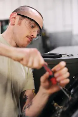 U.S. Air Force Senior Airman Robert Kitchens, 354th Maintenance Squadron aerospace ground equipment mechanic, installs a blower pressure gauge on a cabin leakage tester at Eielson Air Force Base, Alaska. The cabin leakage tester provides a means of pressurizing and automatically measuring the leakage rate of an aircraft cabin. U.S. Air Force Senior Airman Robert Kitchens, 354th Maintenance Squadron aerospace ground equipment mechanic, installs a blower pressure gauge on a cabin leakage tester at Eielson Air Force Base, Alaska. The cabin leakage tester provides a means of pressurizing and automatically measuring the leakage rate of an aircraft cabin.