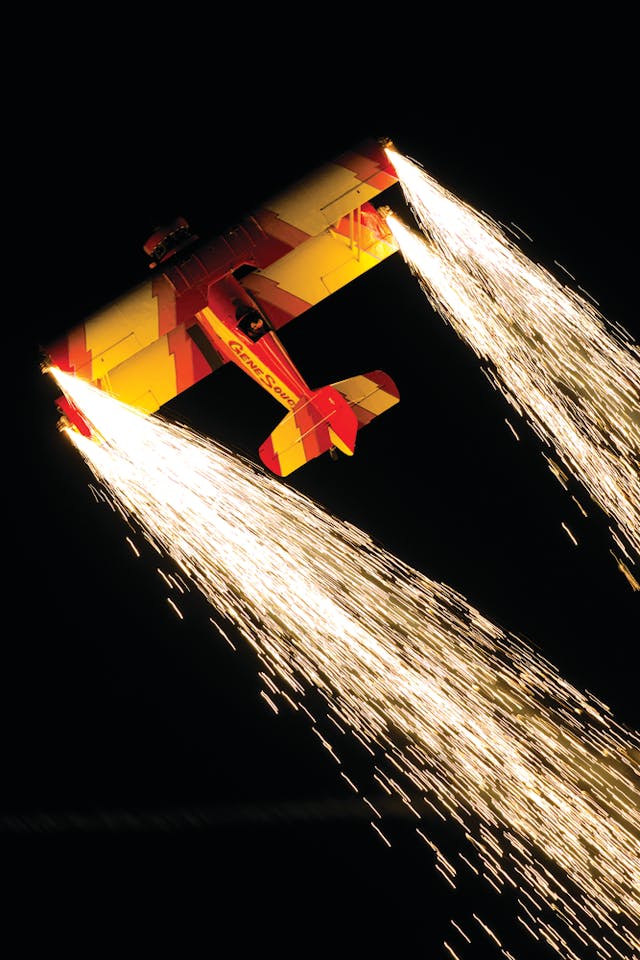 Gene Soucy flies his performance during the 2012 night air show at EAA AirVenture Oshkosh (EAA photo).