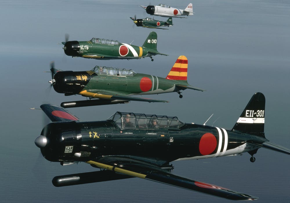 Five aircraft in WWII Japanese markings flown as part of the Tora Tora Tora demonstration that will be part of EAA AirVenture 2013 (Photo courtesy of ToraToraTora.com)