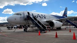 LAN made due with stairs after its ground handler said the carrier's planes could not use passenger boarding bridges at any airport in Argentina. LAN made due with stairs after its ground handler said the carrier's planes could not use passenger boarding bridges at any airport in Argentina.