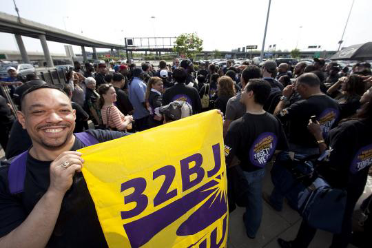 Protesters held their own mock celebration at JFK as dignitaries joined Delta Air Lines at a grand opening celebration of the airport's newly expanded Terminal 4.