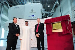 His Highness Sheikh Ahmed bin Saeed Al Maktoum, Chairman and Chief Executive, Emirates Airline and Group presents plaques commemorating ten years of the Emirates-CAE Flight Training partnership to: Jeff Roberts, Group President, Civil Simulation Products, Training and Services, CAE (left) and Gary Chapman, President, Group Services, Emirates (right).