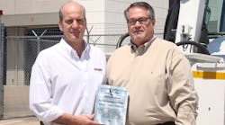 Jerry Derusha, Premier Engineering and Manufacturing alongside Larry Laney, director of ground support for Southwest Airlines. Jerry Derusha, Premier Engineering and Manufacturing alongside Larry Laney, director of ground support for Southwest Airlines.