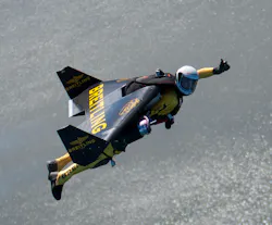A thumbs-up from Yves 'Jetman' Rossy, who is making his first public U.S. flights at EAA AirVenture Oshkosh 2013. (Photo courtesy of Breitling) A thumbs-up from Yves 'Jetman' Rossy, who is making his first public U.S. flights at EAA AirVenture Oshkosh 2013. (Photo courtesy of Breitling)