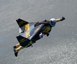 A thumbs-up from Yves &apos;Jetman&apos; Rossy, who is making his first public U.S. flights at EAA AirVenture Oshkosh 2013. (Photo courtesy of Breitling)