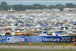 AirVenture officials vow the convention and daily airshows will be held but say the money demanded by the FAA will be a financial burden.