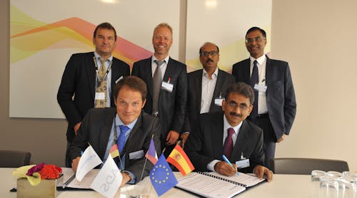 Matthieu Louvot, Senior Vice President of Support and Services, Eurocopter and P. R. Venketrama Raja, Vice Chairman &amp; Managing Director, Ramco Systems signing the partnership agreement in the presence of Rick Peeks and Antoine Rivet from Eurocopter and Virender Aggarwal and Ranganathan Jagannathan from Ramco Systems.