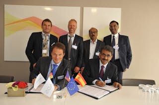 Matthieu Louvot, Senior Vice President of Support and Services, Eurocopter and P. R. Venketrama Raja, Vice Chairman &amp; Managing Director, Ramco Systems signing the partnership agreement in the presence of Rick Peeks and Antoine Rivet from Eurocopter and Virender Aggarwal and Ranganathan Jagannathan from Ramco Systems.
