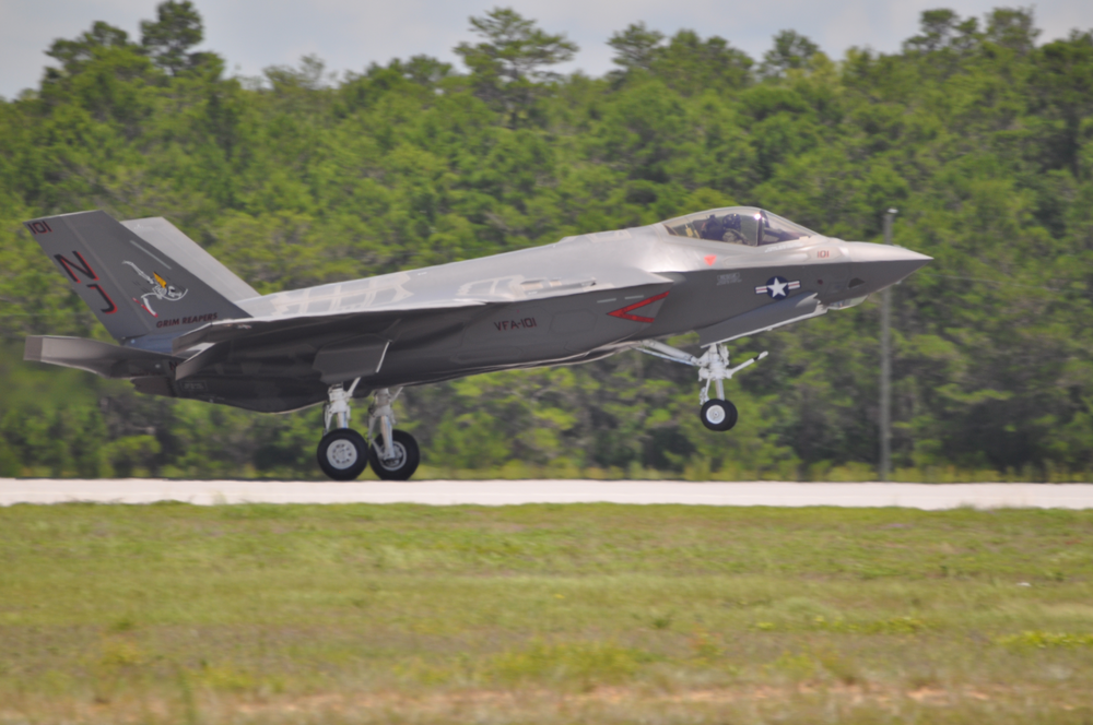 EGLIN AIR FORCE BASE, Fla. (June 22, 2013) Lt. Cmdr. Christopher Tabert, F-35C Lightning II instructor pilot, U.S. Navy Strike Fighter Squadron VFA-101 lands this afternoon at Eglin Air Force Base's 33d Fighter Wing after a two hour flight from Ft. Worth, Texas. The U.S. Navy's Strike Fighter Squadron (VFA) 101 received the Navy's first F-35C Lightning II carrier variant aircraft from Lockheed Martin today at the squadron's home at Eglin Air Force Base, Fla. VFA 101, based at Eglin Air Force Base, will serve as the F-35C Fleet Replacement Squadron, training both aircrew and maintenance personnel to fly and repair the F-35C. U.S. Air Force Photo by Maj. Karen Roganov, 33d Fighter Wing Public Affairs